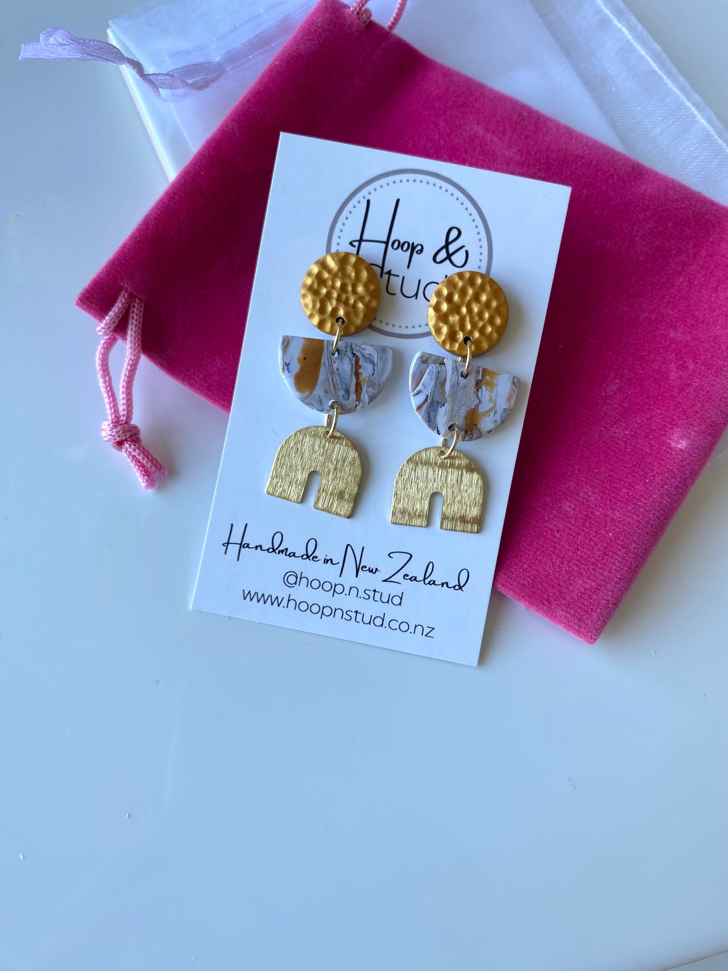 Marbled gold with charms