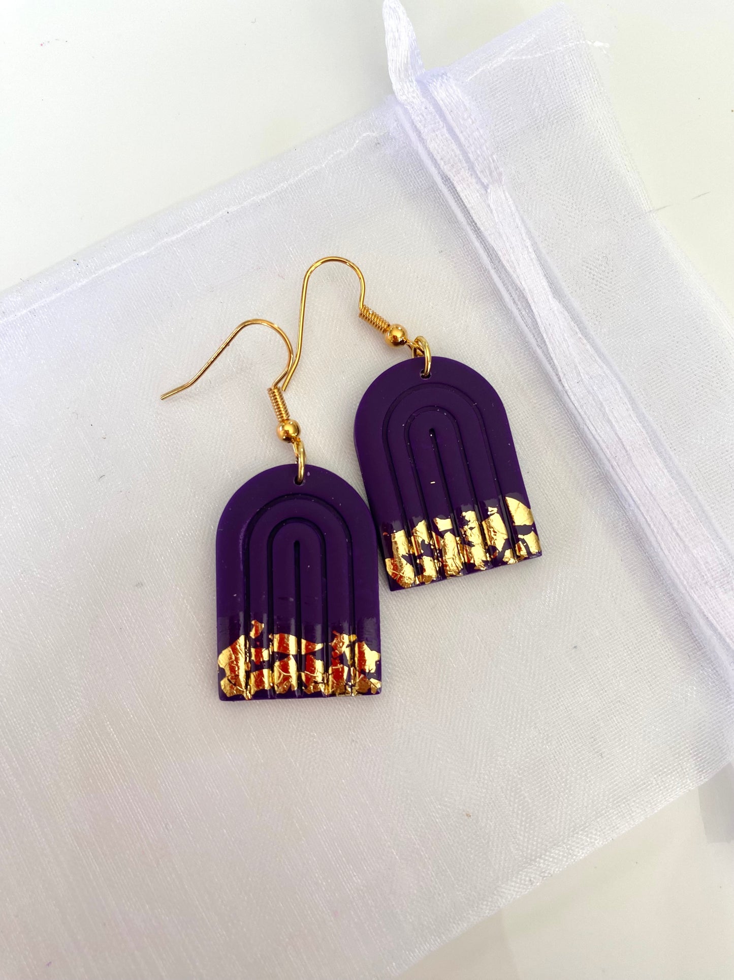 Purple and gold earrings