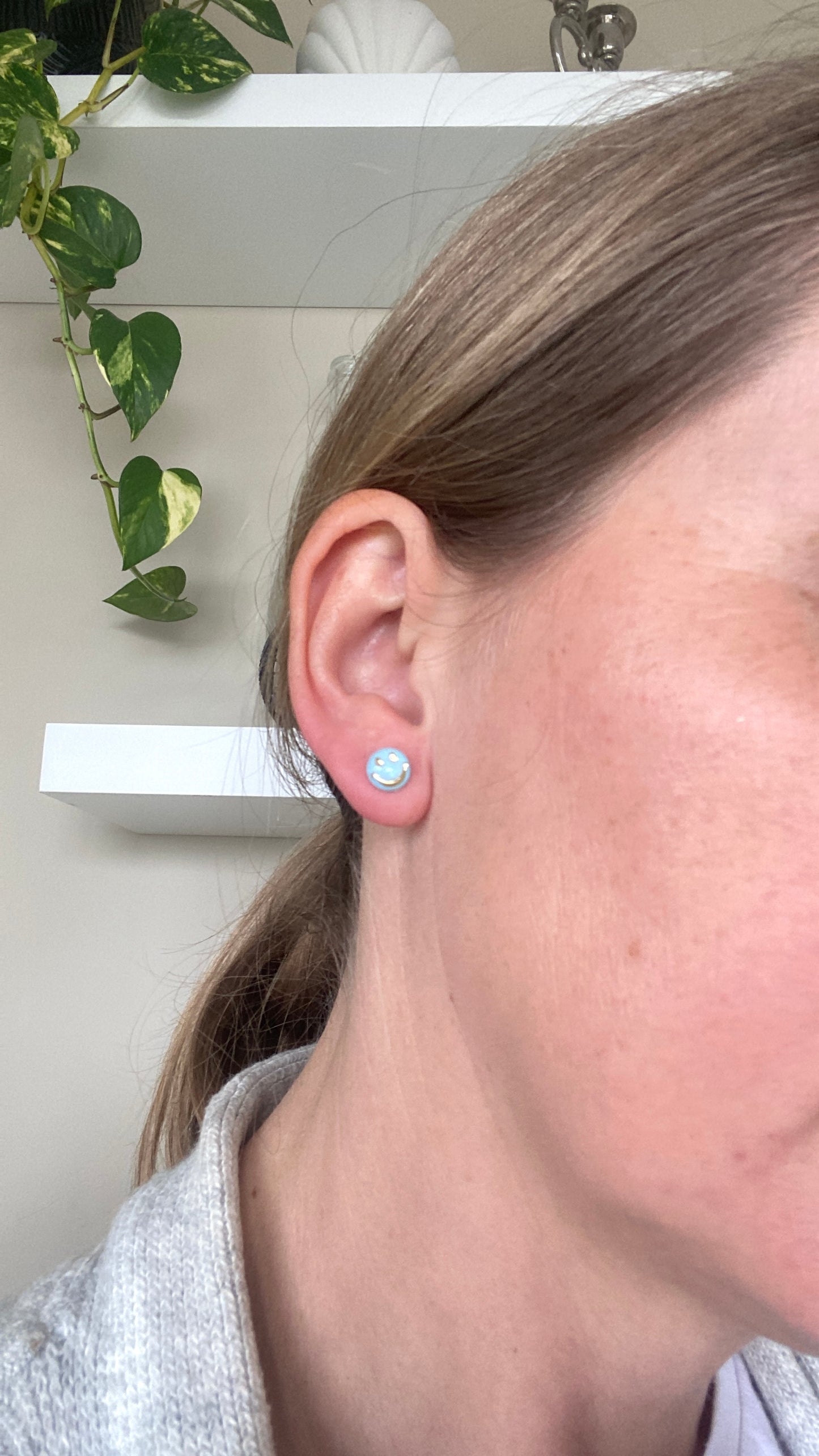 Smiley face studs