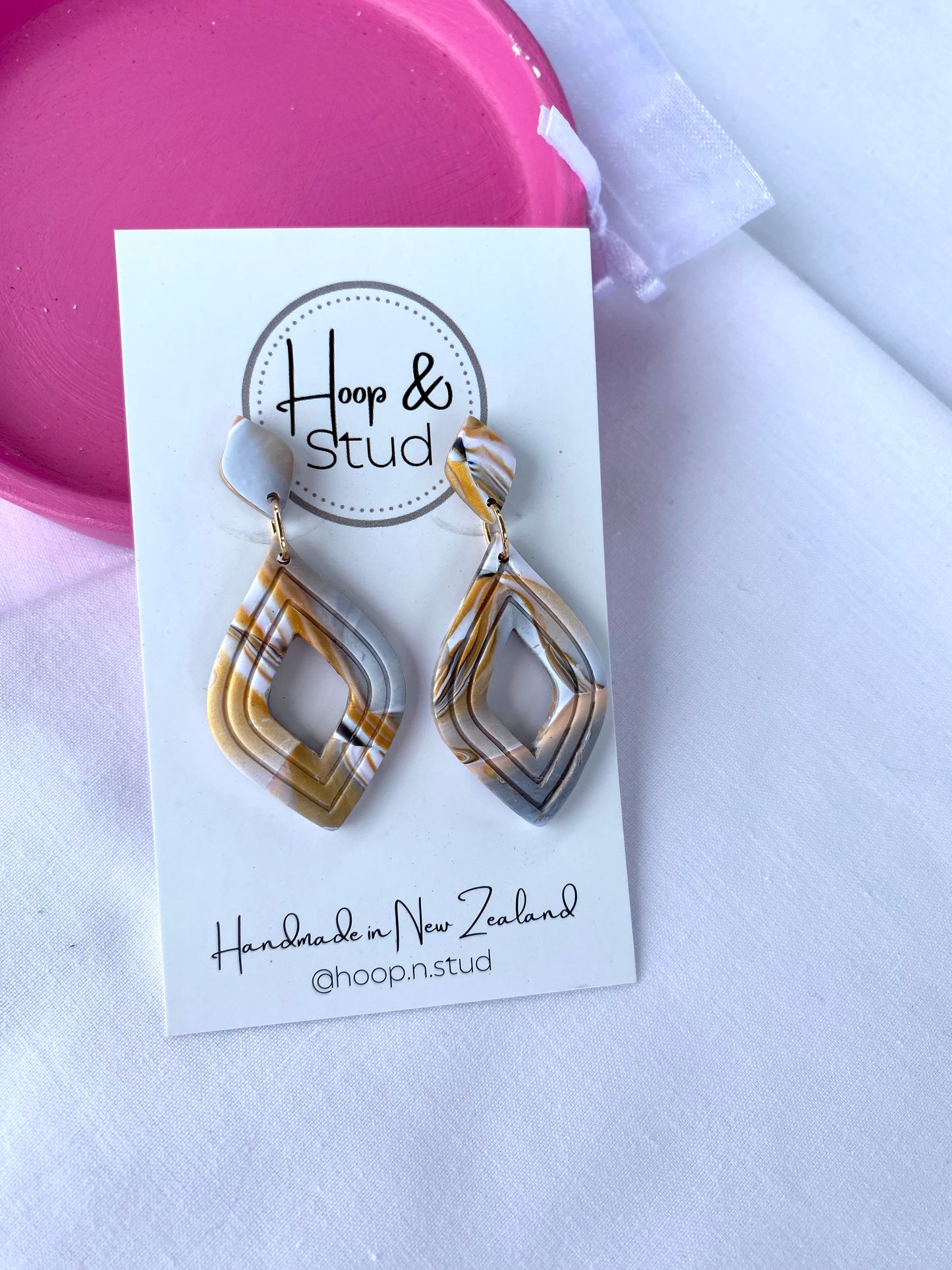 Black and gold earrings
