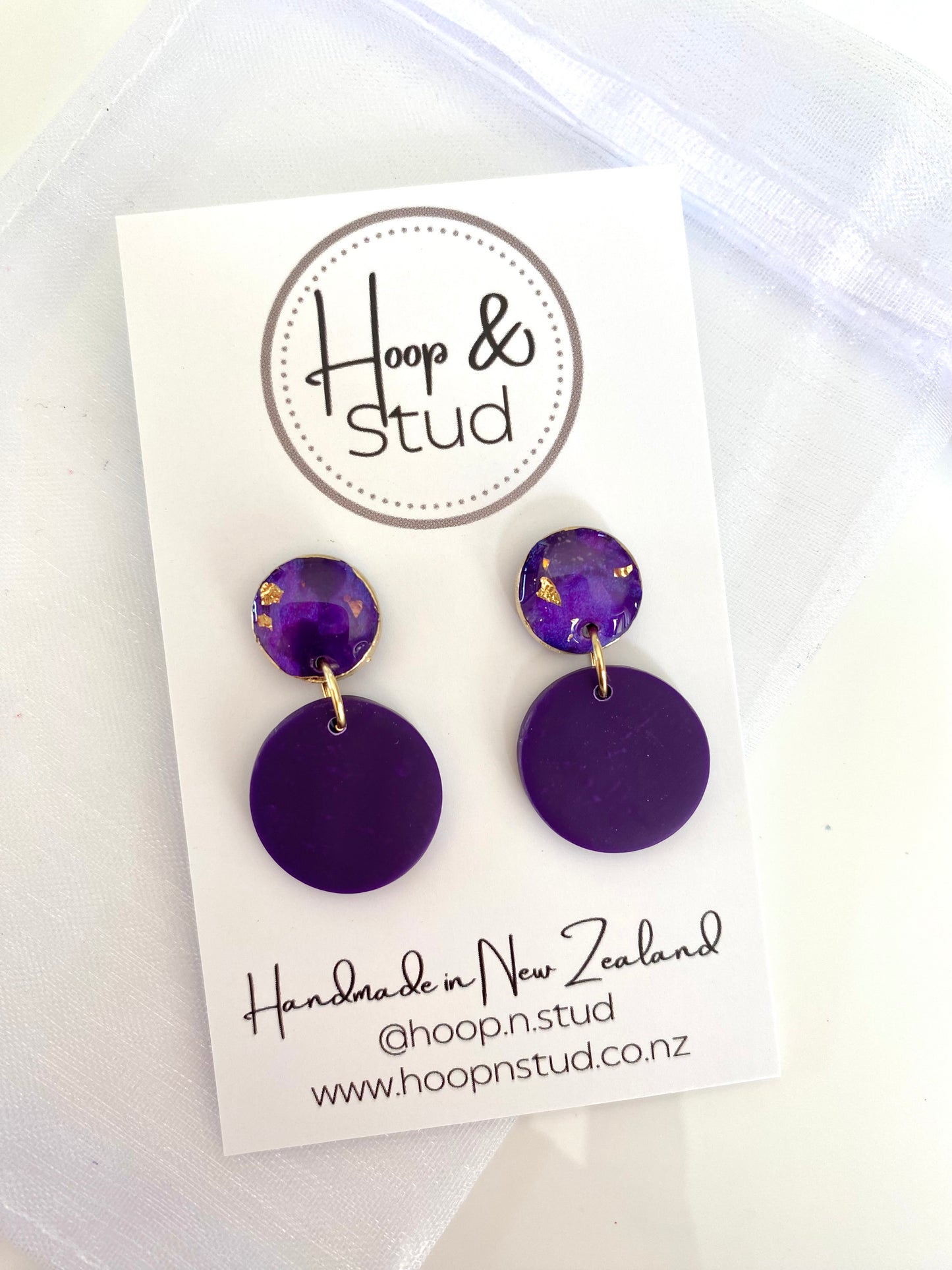 Purple and gold earrings