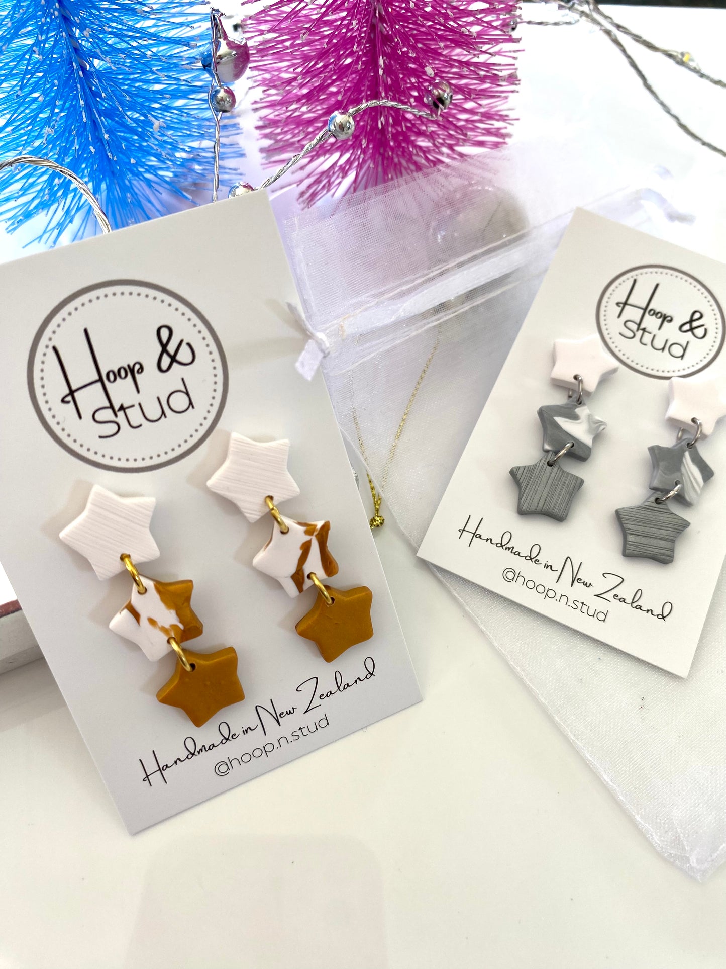 Triple star earrings