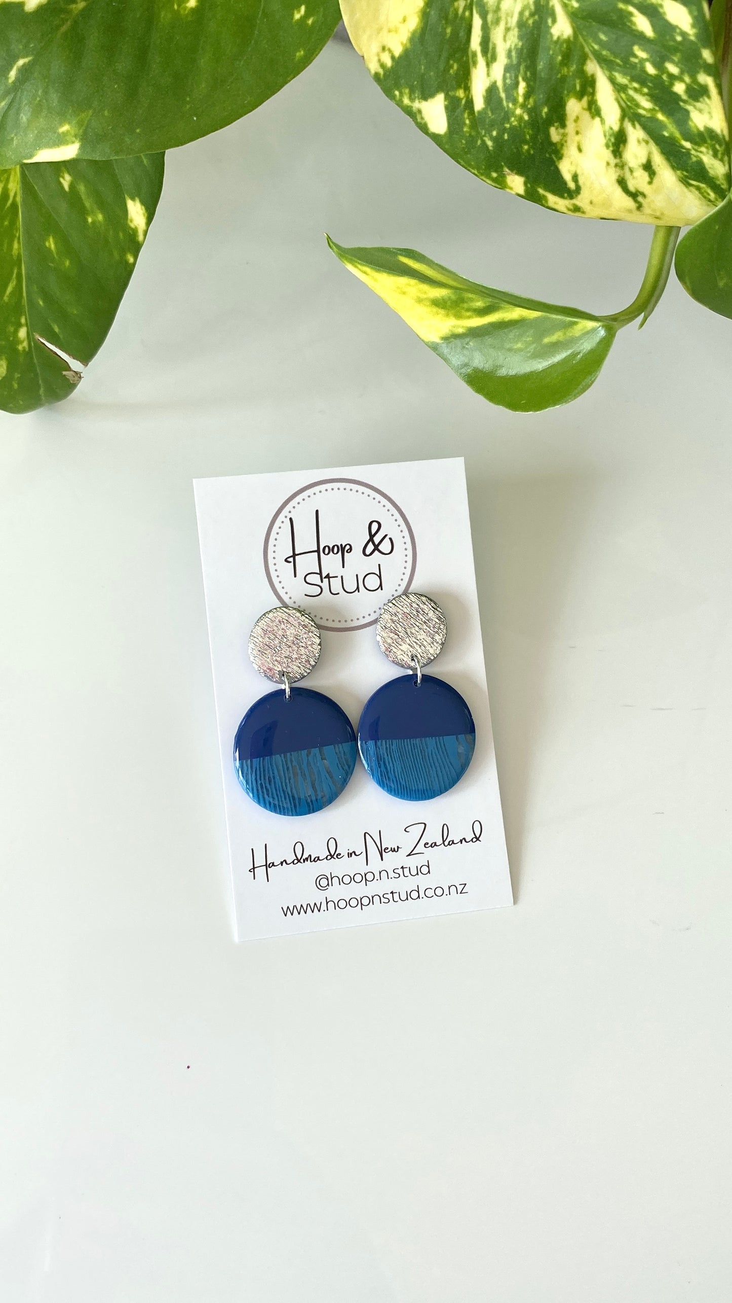 Half navy earrings