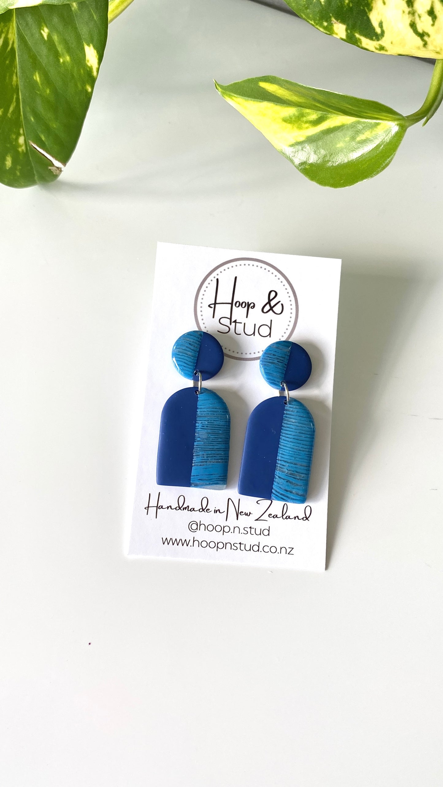 Half navy earrings