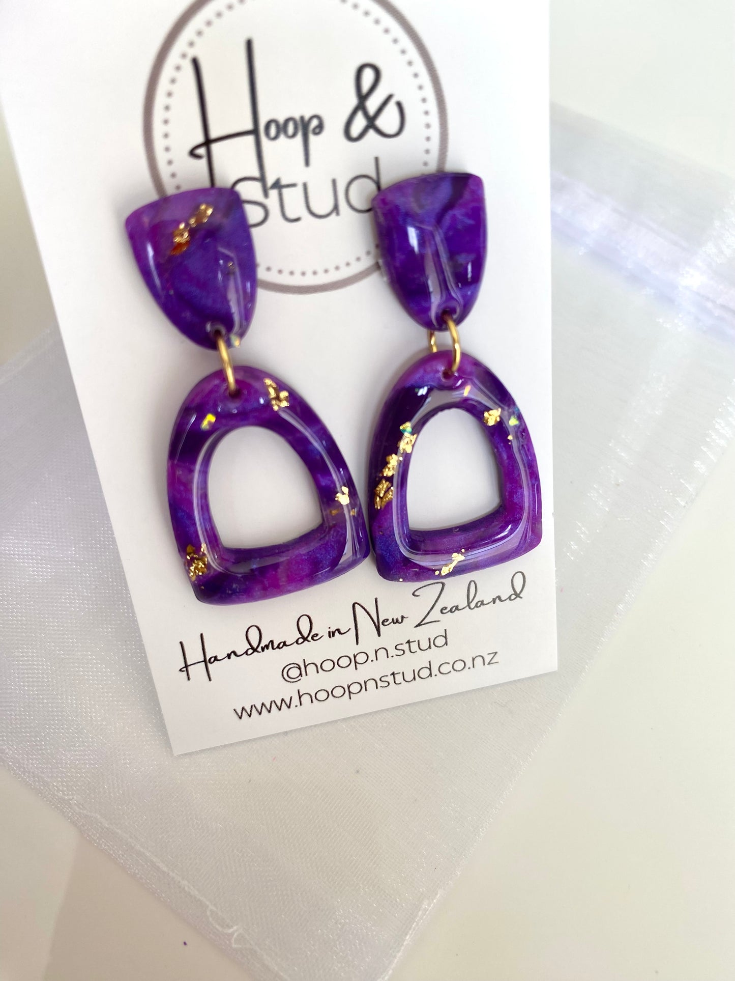 Purple and gold earrings