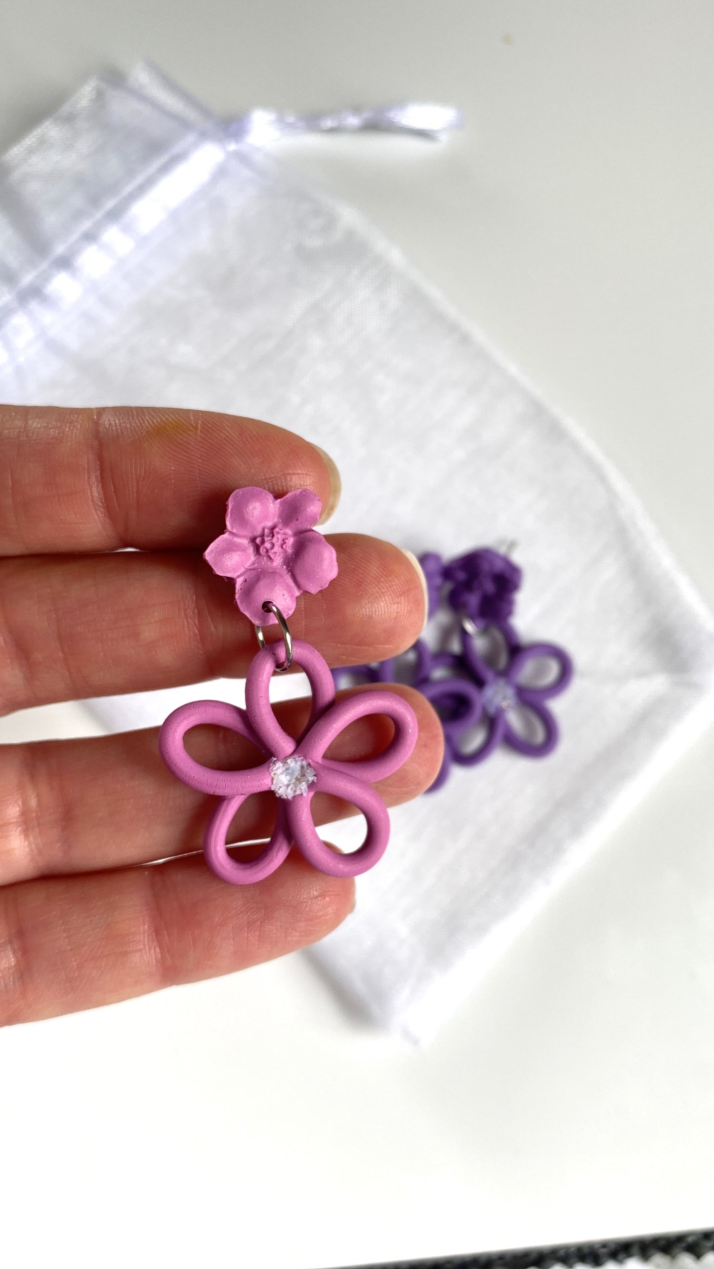 Extruded double flower earrings