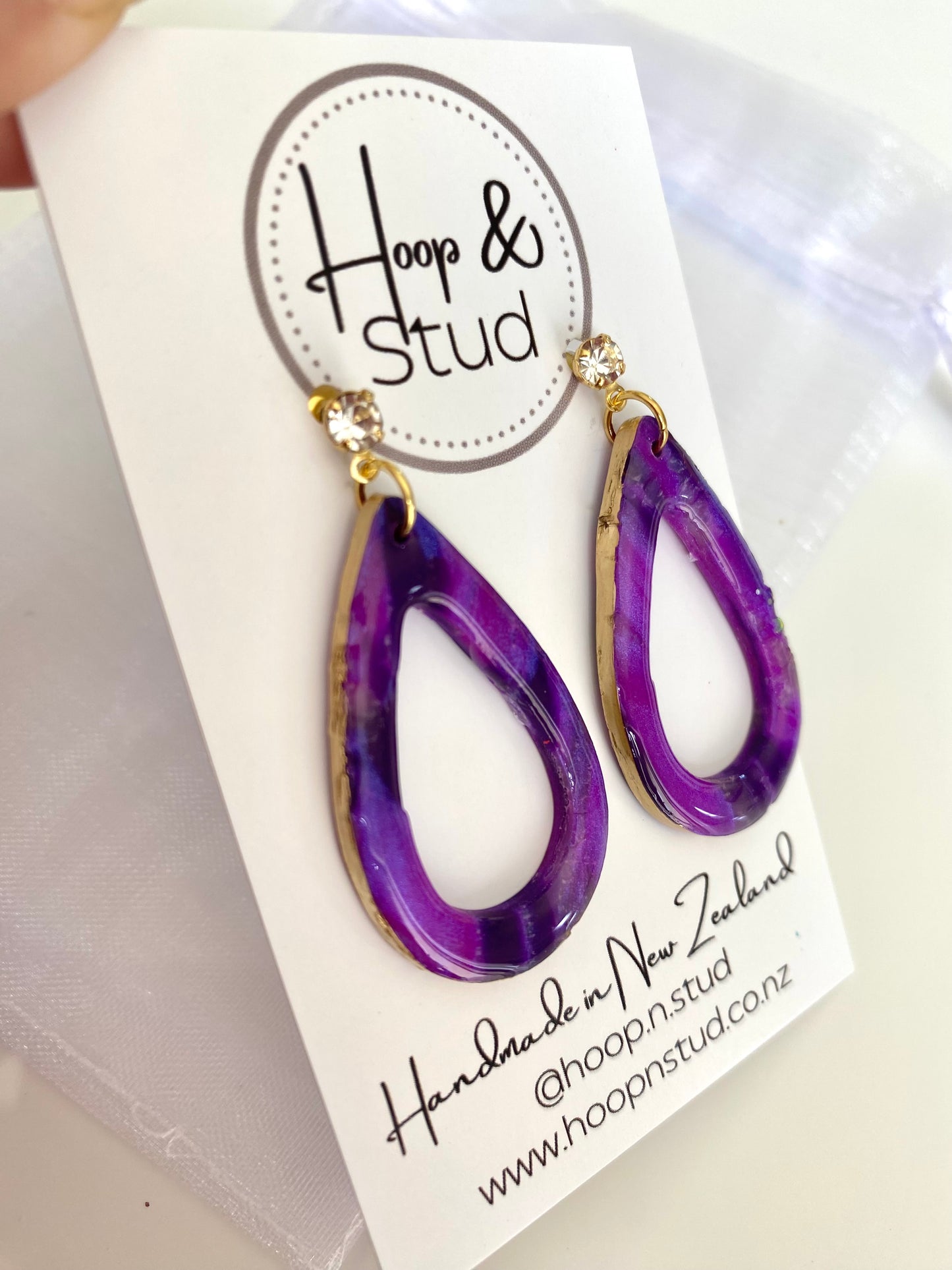 Purple and gold earrings