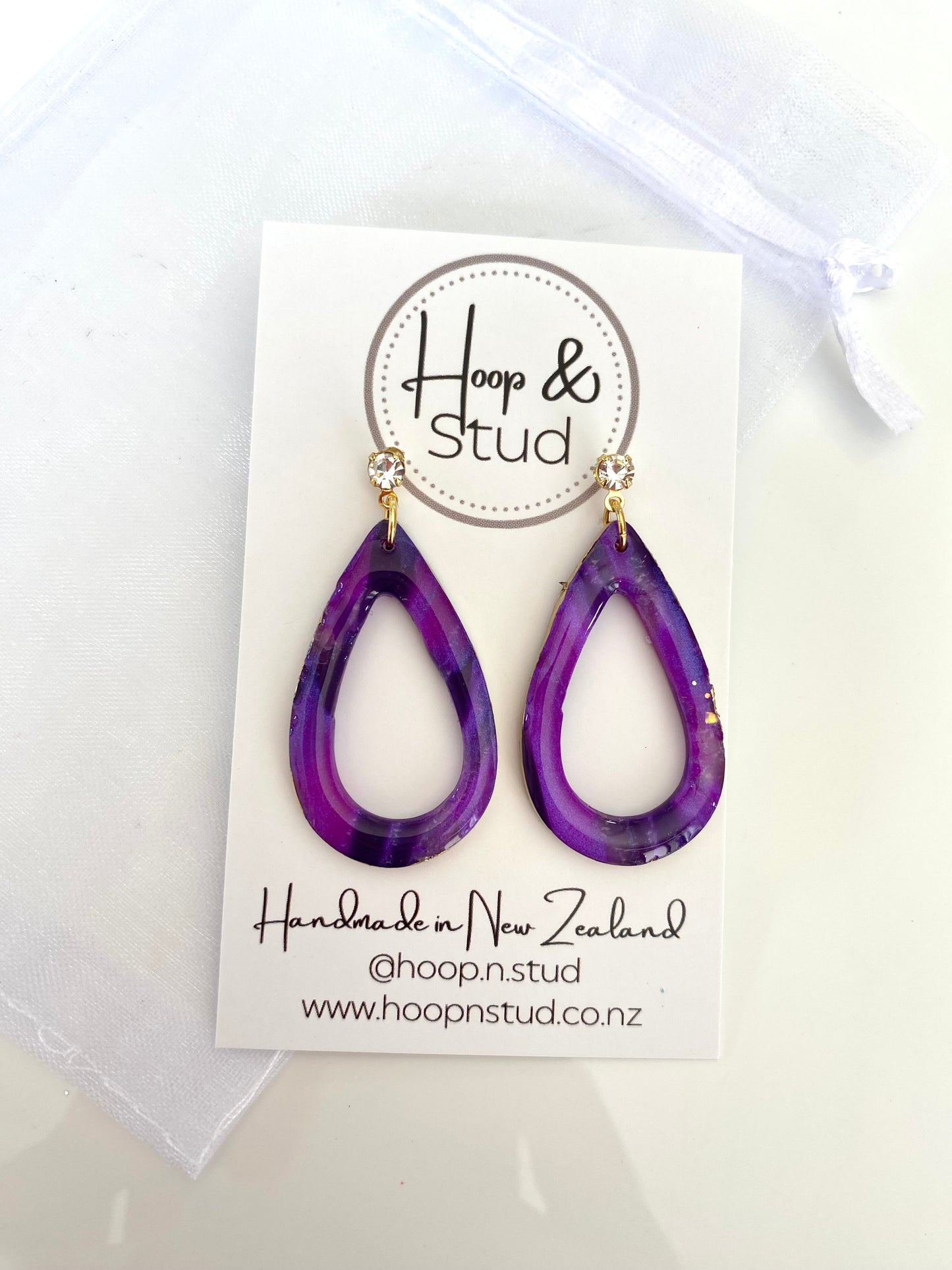 Purple and gold earrings