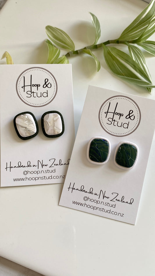 Bezeled statement studs