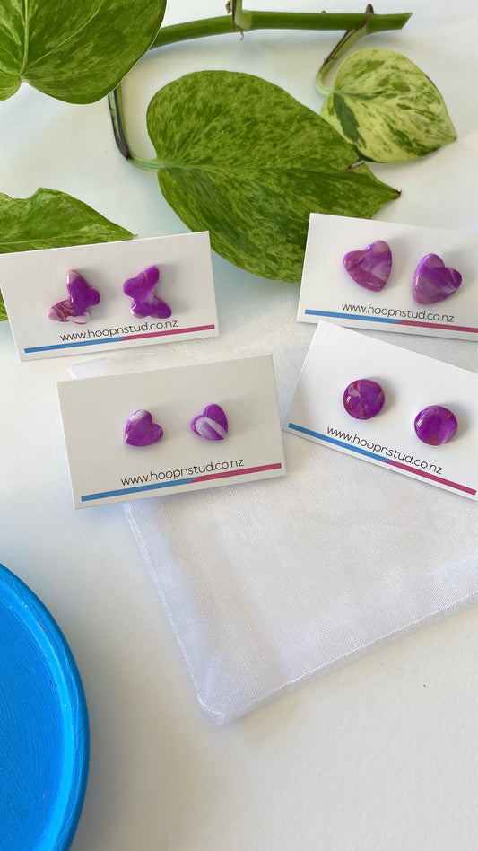 Marbled purple studs