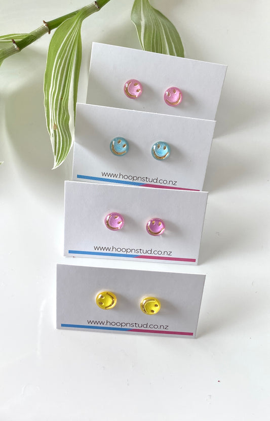 Smiley face studs