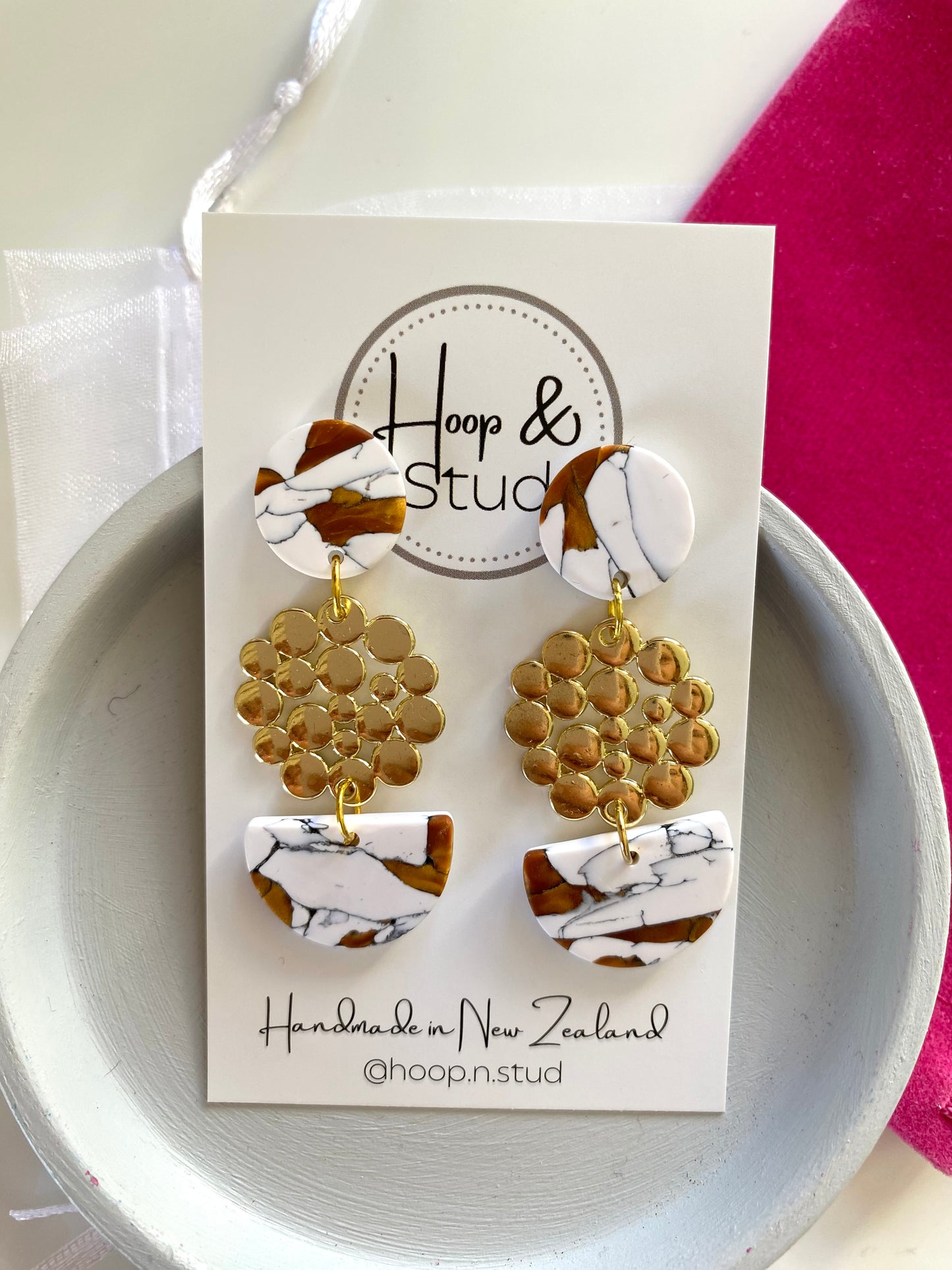 Marbled gold with charms